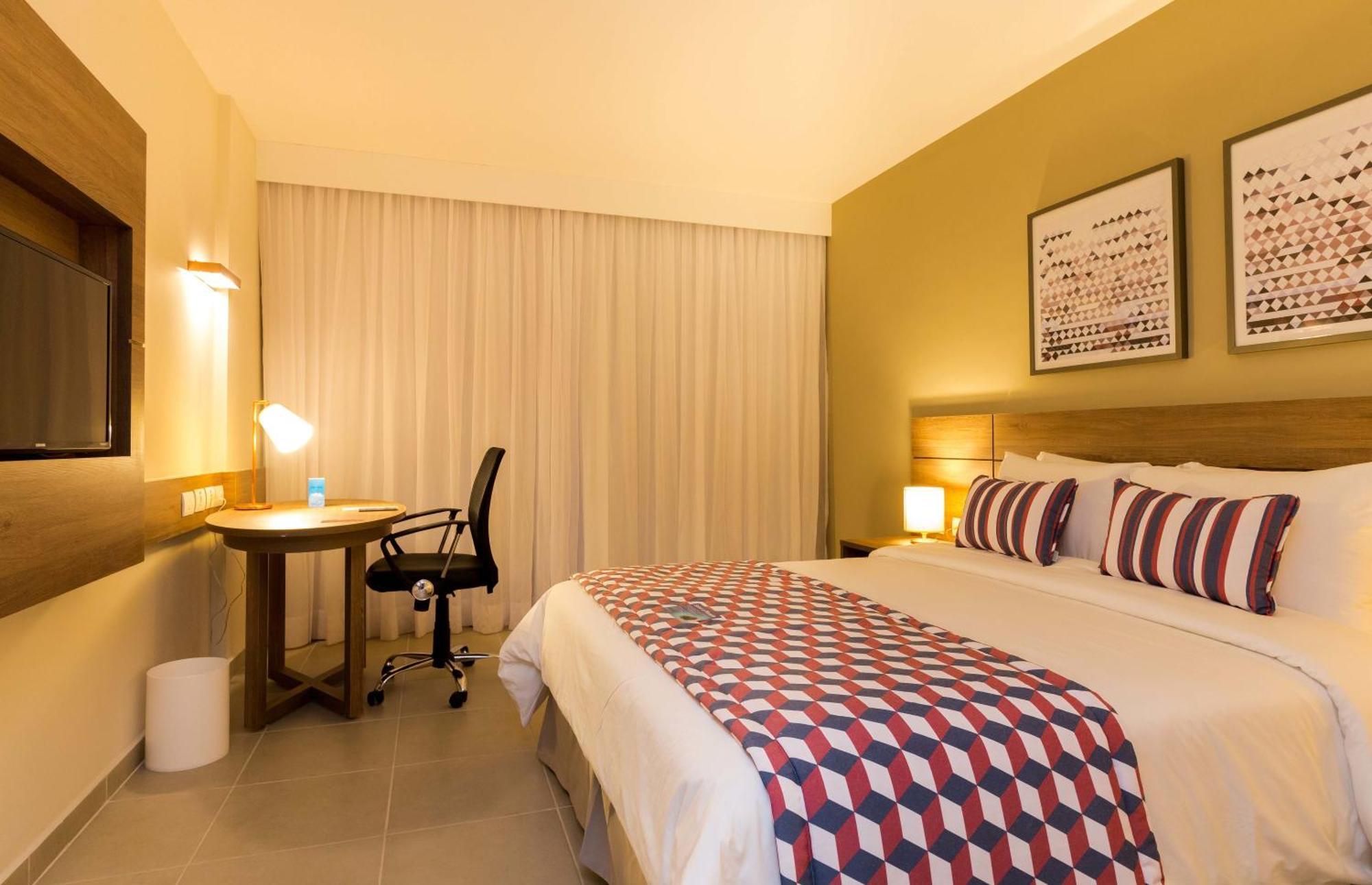 Tulip Inn Campos Dos Goytacazes Quarto foto